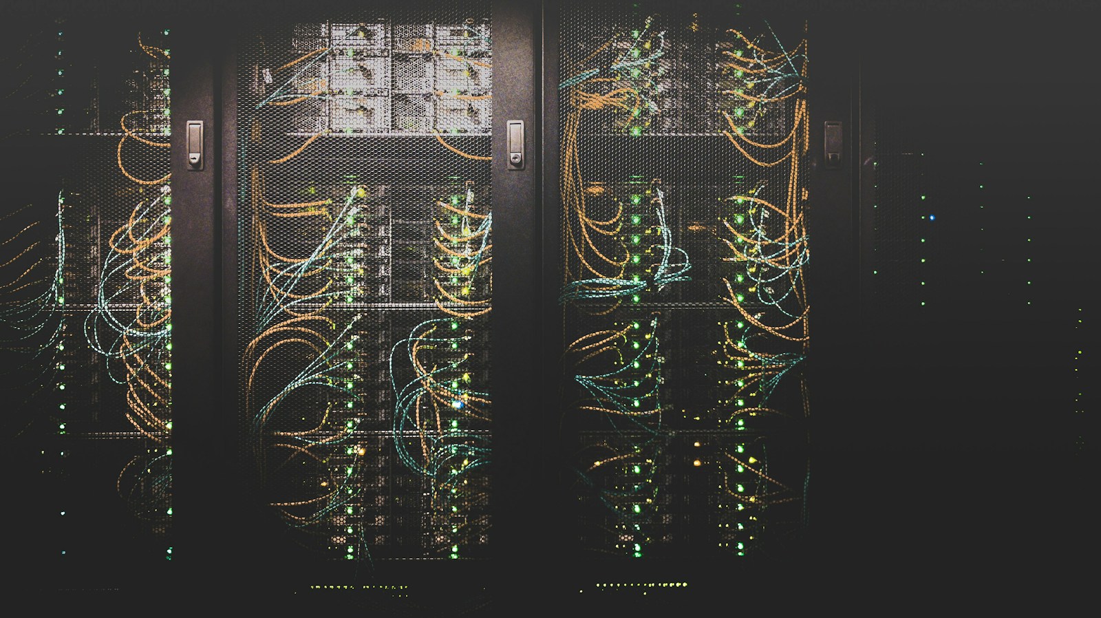 Network cables and server racks in a data center